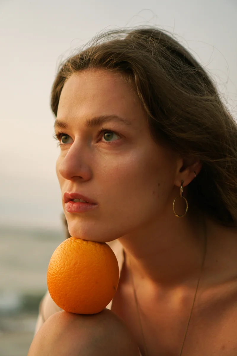 assets/6-woman-orange